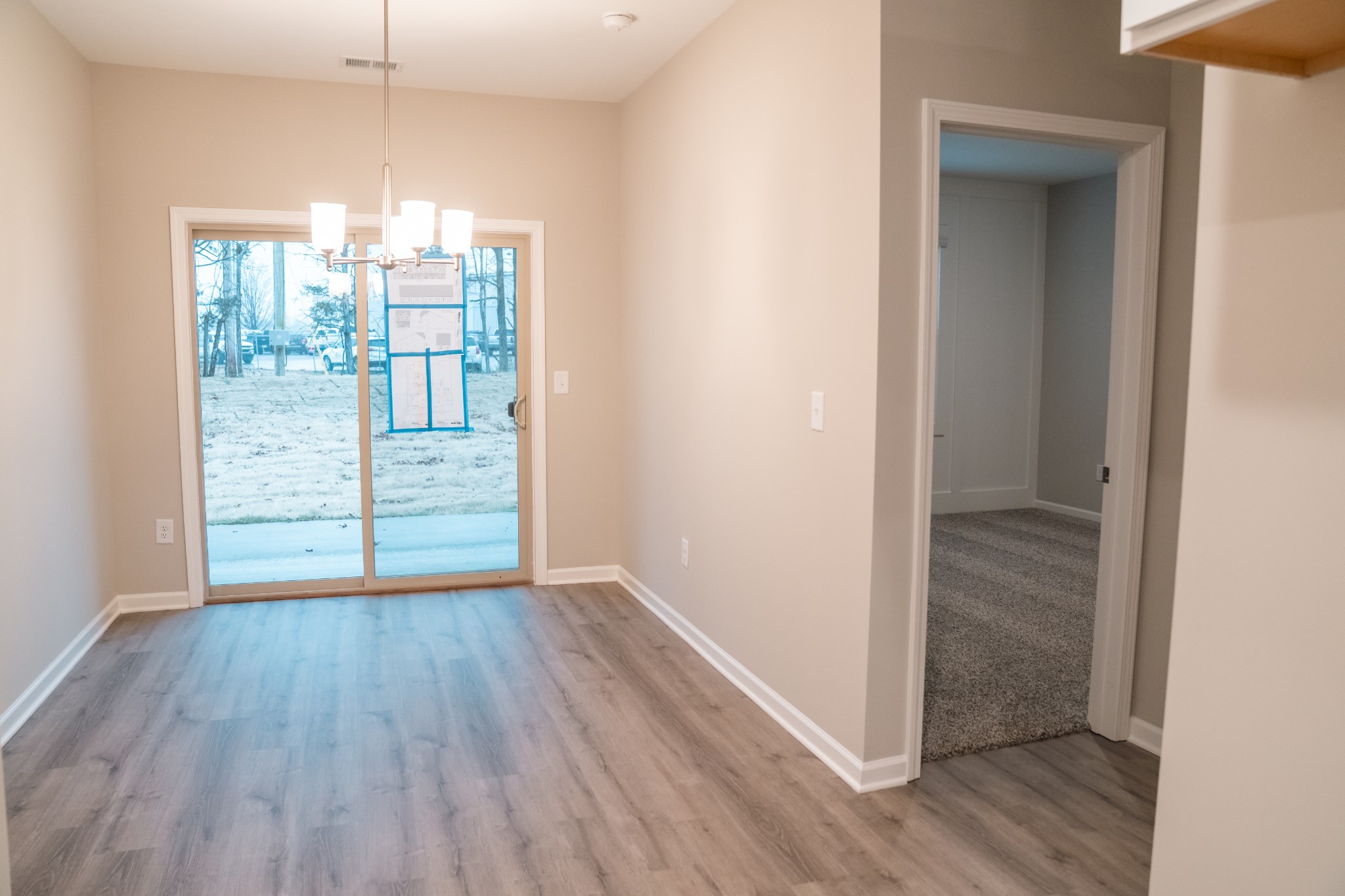337 Carver Connection, Unit 33 Lebanon, TN 37087 - Photo 5 of 21 wooden floor in an empty room with a window