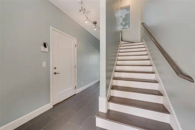 a view of an entryway with staircase