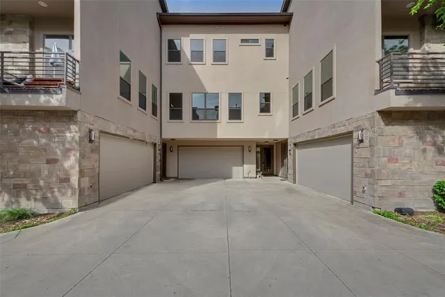 a front view of a building with a street
