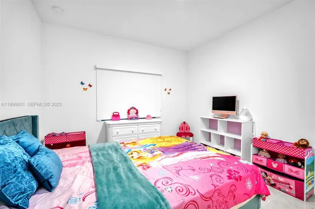 a bathroom with a sink toilet tub and shower