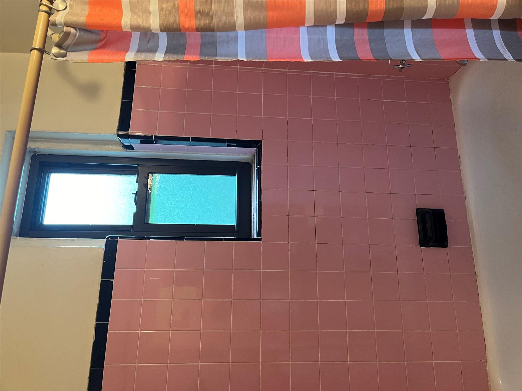 33-24 Junction Boulevard, Unit 3M Queens, NY 11372 - Photo 14 of 15 a bathroom with a shower