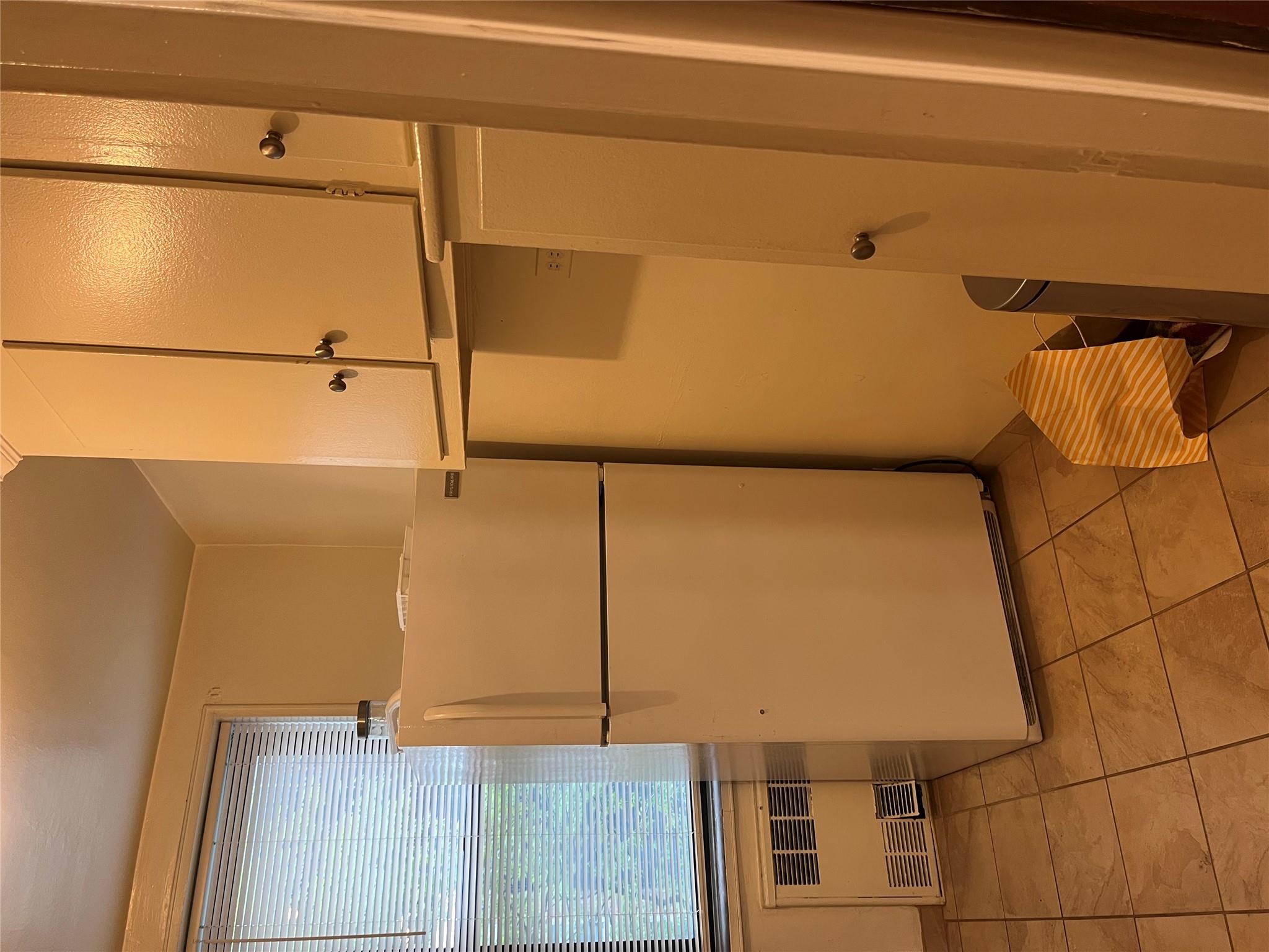 33-24 Junction Boulevard, Unit 3M Queens, NY 11372 - Photo 7 of 15 a view of a storage & utility room with washer and dryer