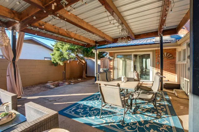 a view of backyard and tree