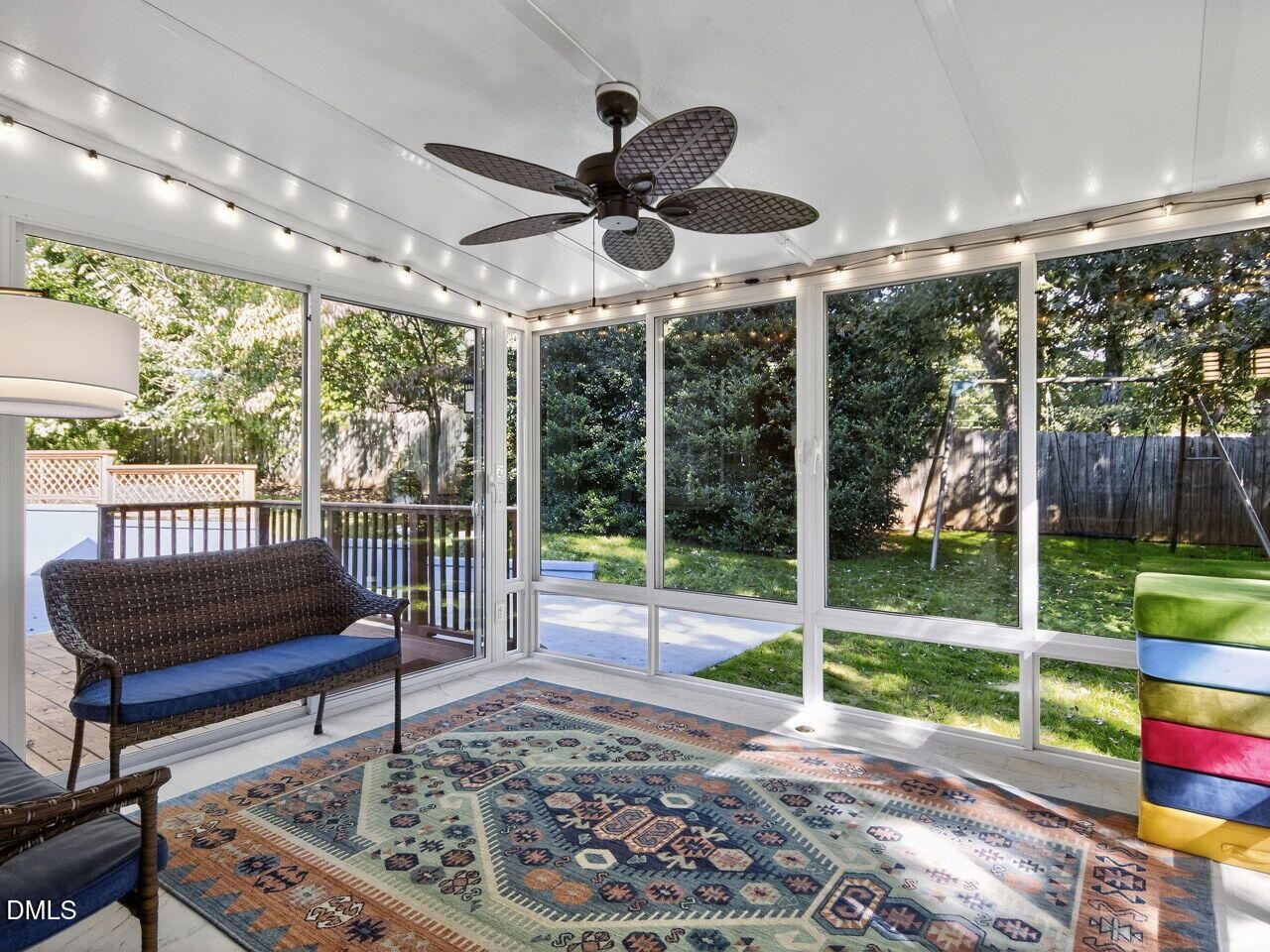 6736 Hammersmith Drive Raleigh, NC 27613 - Photo 15 of 42 a view of a porch with furniture and a yard