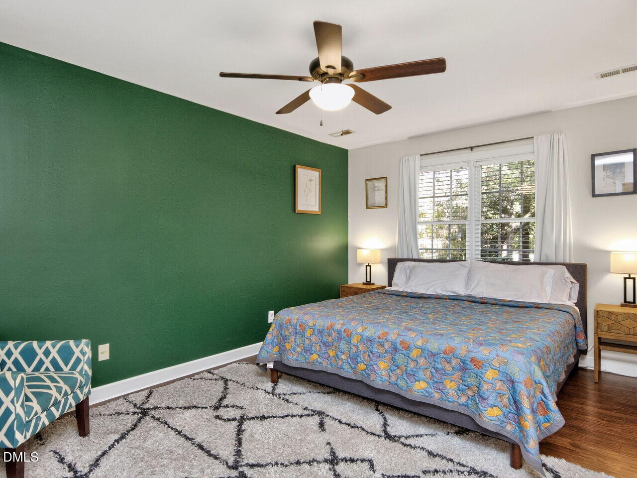6736 Hammersmith Drive Raleigh, NC 27613 - Photo 18 of 42 a bedroom with a bed and a window