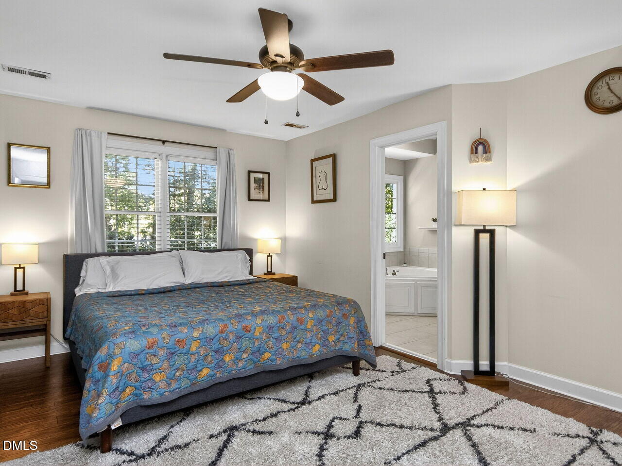 6736 Hammersmith Drive Raleigh, NC 27613 - Photo 19 of 42 a bedroom with a bed and a window