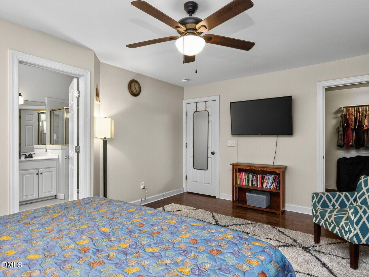 6736 Hammersmith Drive Raleigh, NC 27613 - Photo 20 of 42 a bedroom with furniture and a flat screen tv