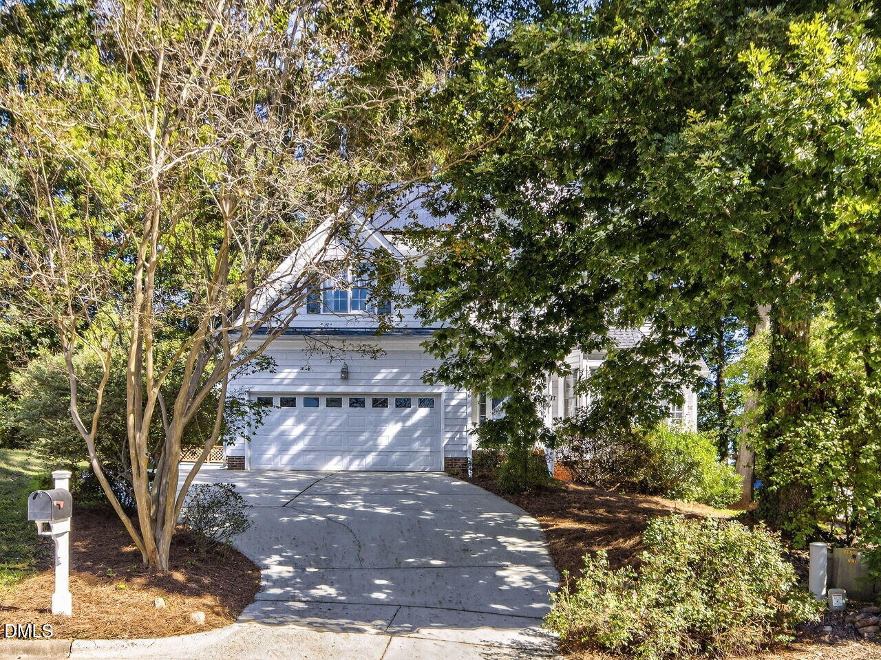 6736 Hammersmith Drive Raleigh, NC 27613 - Photo 2 of 42 a view of a tree with a yard