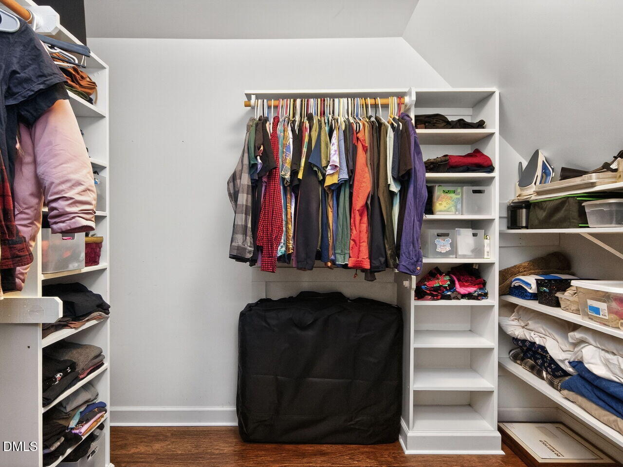 6736 Hammersmith Drive Raleigh, NC 27613 - Photo 23 of 42 a view of walk in closet with clothes and shoes