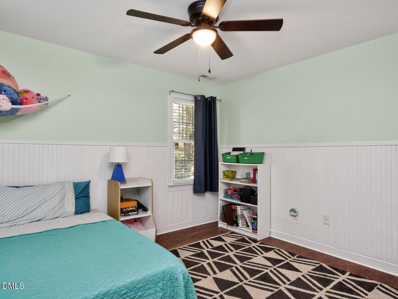 6736 Hammersmith Drive Raleigh, NC 27613 - Photo 26 of 42 a bedroom with furniture and a book shelf
