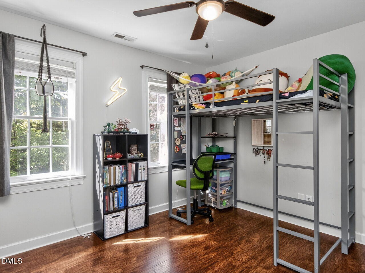 6736 Hammersmith Drive Raleigh, NC 27613 - Photo 30 of 42 a garage room with furniture and a window