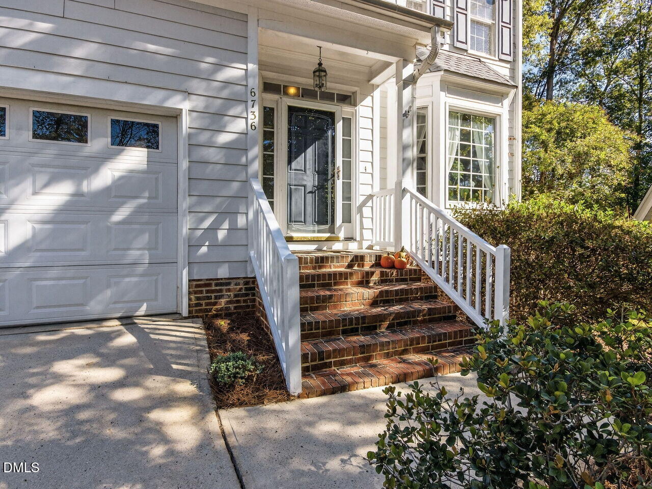 6736 Hammersmith Drive Raleigh, NC 27613 - Photo 3 of 42 a view of a house with backyard and porch