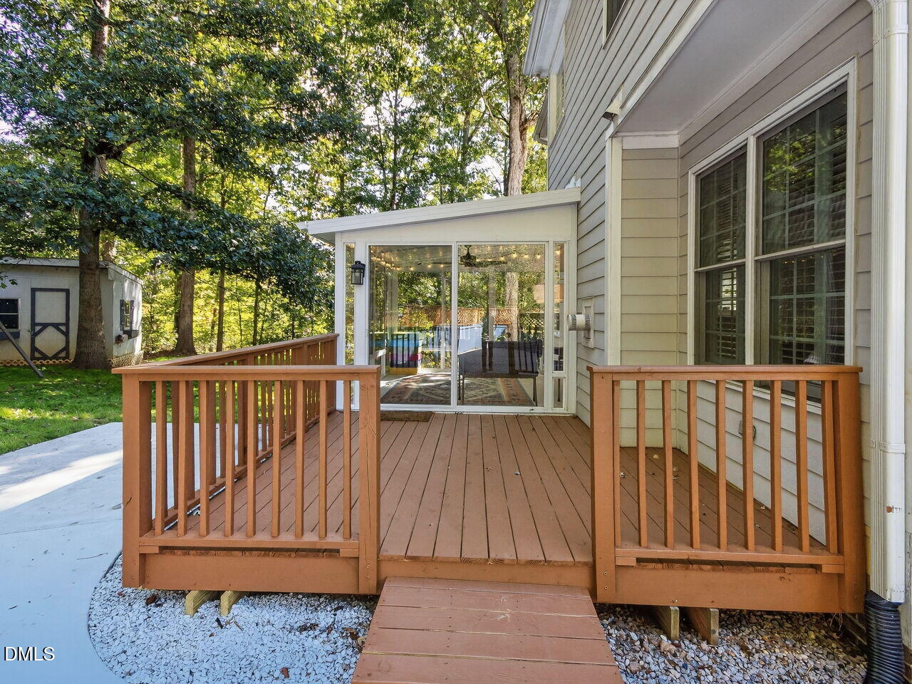 6736 Hammersmith Drive Raleigh, NC 27613 - Photo 36 of 42 a view of backyard with large trees and wooden fence