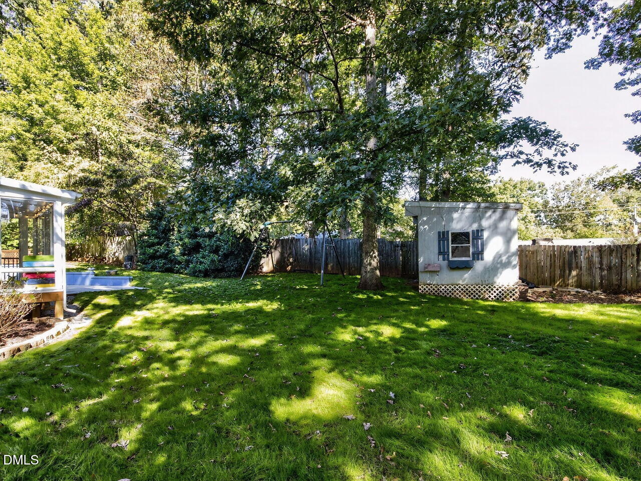 6736 Hammersmith Drive Raleigh, NC 27613 - Photo 39 of 42 a front view of a house with garden