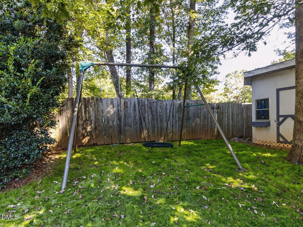 6736 Hammersmith Drive Raleigh, NC 27613 - Photo 40 of 42 a garden with wooden fences