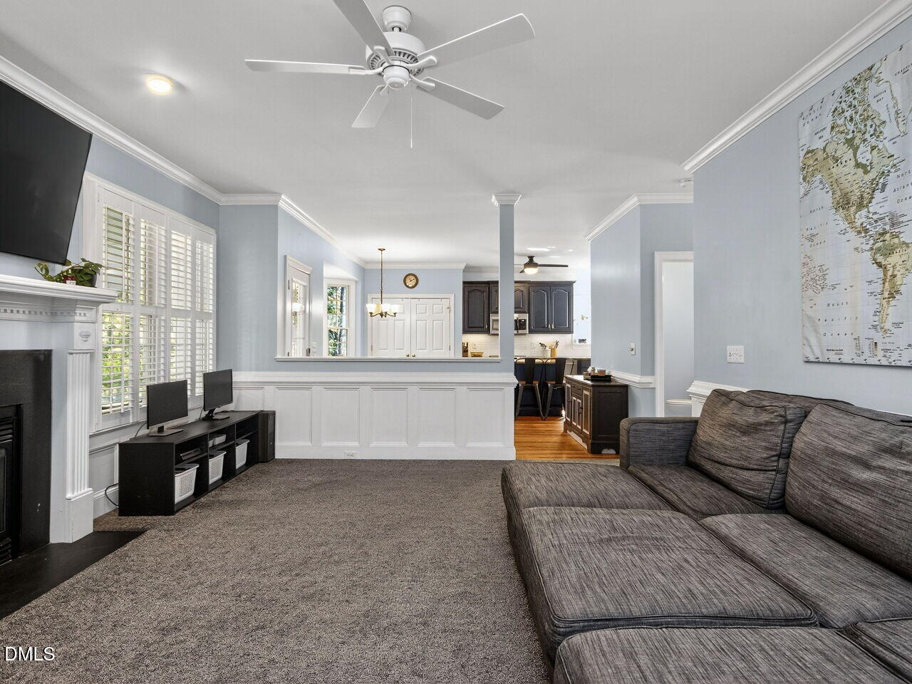 6736 Hammersmith Drive Raleigh, NC 27613 - Photo 9 of 42 a living room with furniture and a flat screen tv