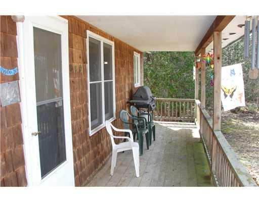 301 Village Road Stetson, ME 04488 - Photo 3 of 24 Patio/Deck. Covered front porch
