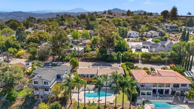 a view of a swimming pool with a patio