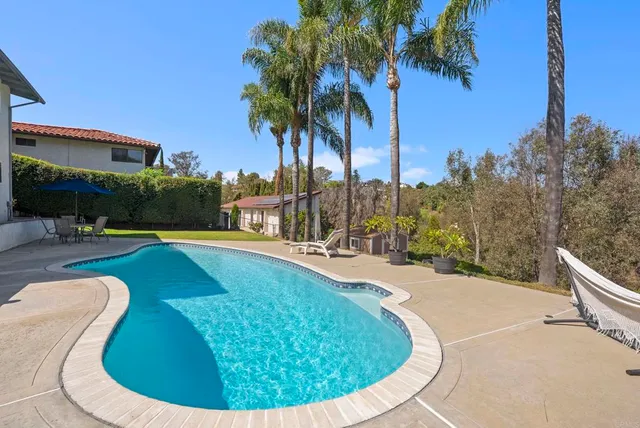 a front view of a house with patio outdoor seating