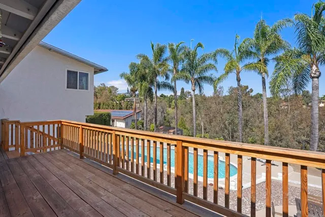 a view of a dinning table and chairs in the patio