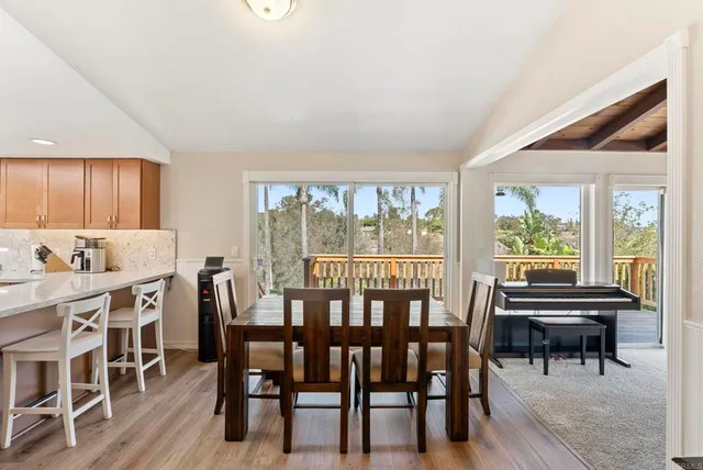 a living room with furniture gym equipment and a flat screen tv