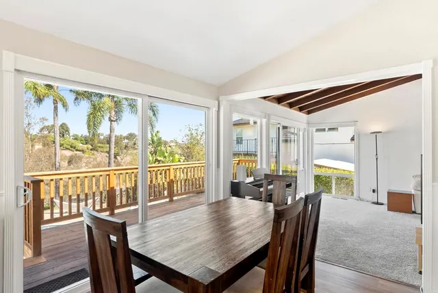 a bedroom with a bed and a desk