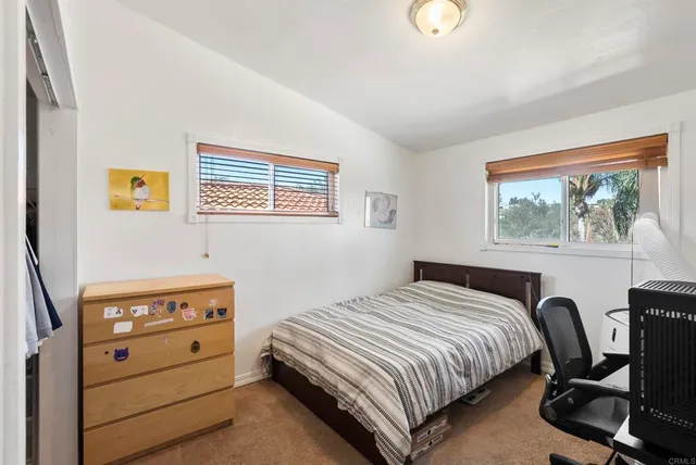 a view of a yard with trees