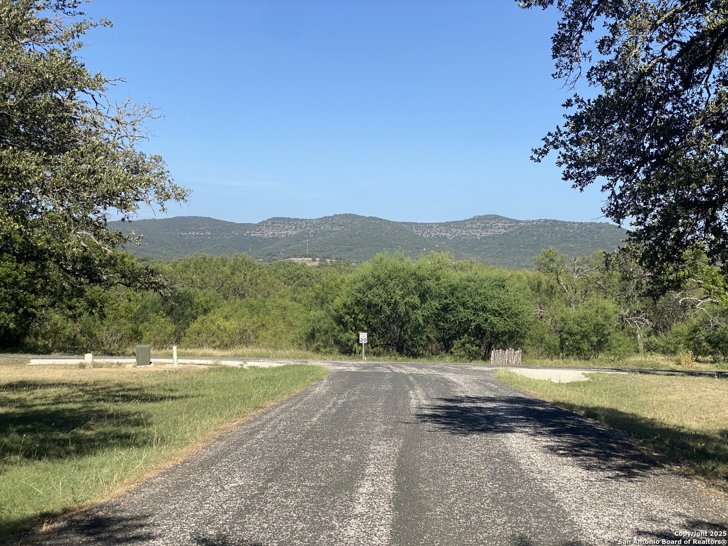 935 Ridge Loop Rio Frio, TX 78879 - Photo 2 of 23 a view of a town with mountains in the background