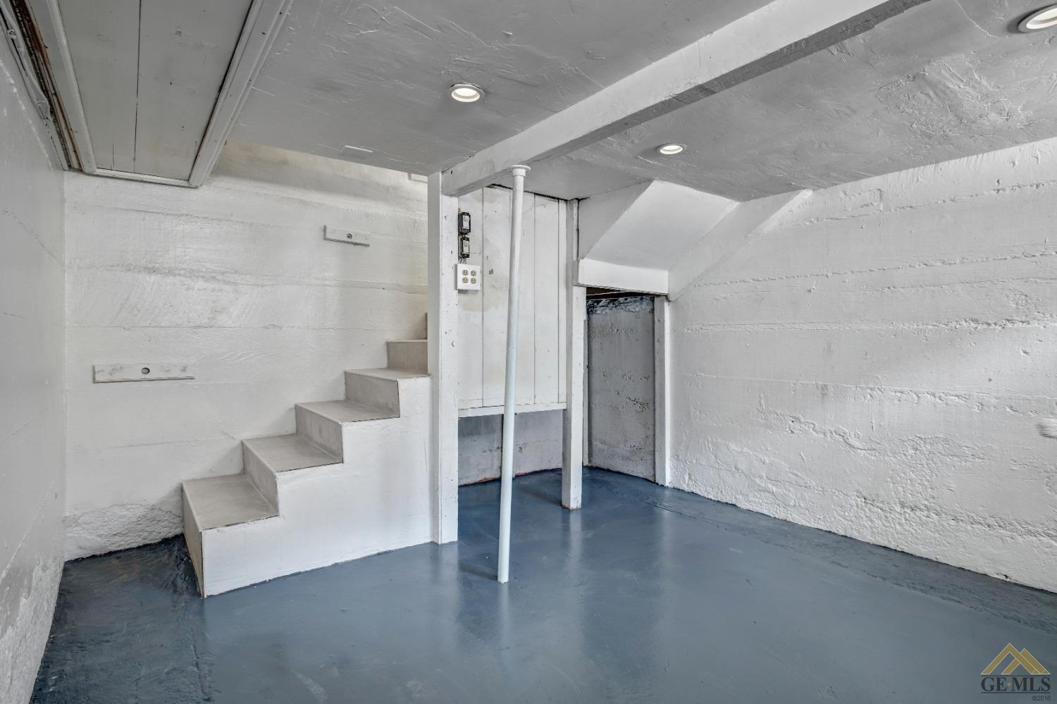 Undisclosed Address Bakersfield, CA 93308 - Photo 22 of 34 a view of an empty room with wooden floor and a bathroom