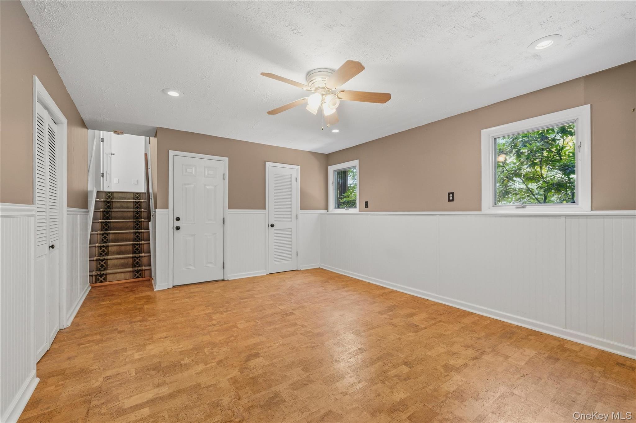 44 Sayer Road Blooming Grove, NY 10914 - Photo 24 of 39 an empty room with windows and fan