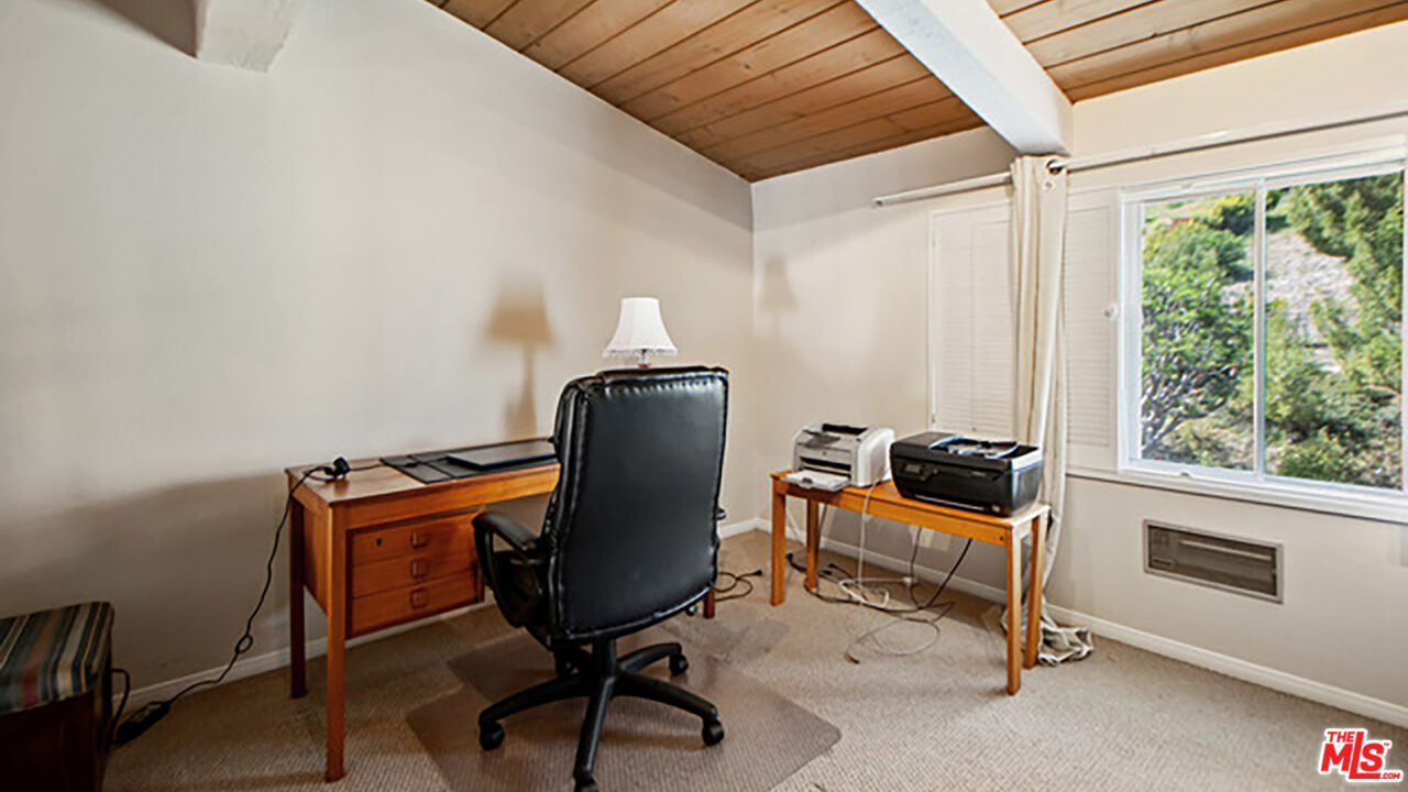 28286 Rey De Copas Lane Malibu, CA 90265 - Photo 17 of 26 a view of workspace with furniture and a window