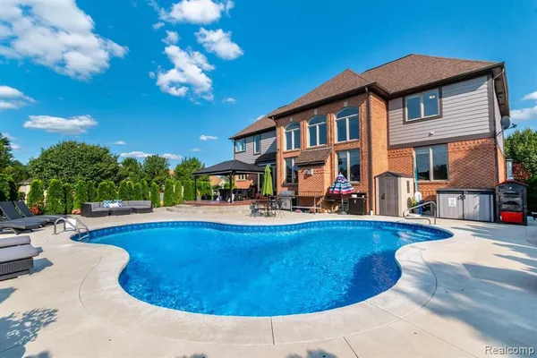 $825,000 | 57629 Stonebriar Drive, Washington, MI 48094