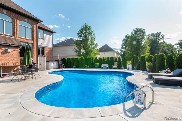 $840,000 | 57629 Stonebriar Drive, Washington, MI 48094