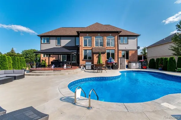 $825,000 | 57629 Stonebriar Drive, Washington, MI 48094