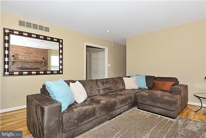 2201 Corbett Road Monkton, MD 21111 - Photo 11 of 30 a living room with furniture and a flat screen tv
