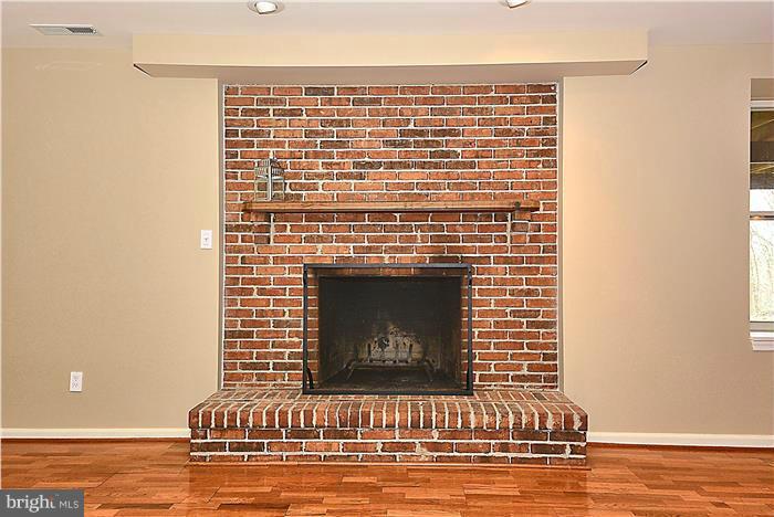 2201 Corbett Road Monkton, MD 21111 - Photo 21 of 30 a view of fireplace with wooden floor