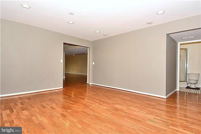 2201 Corbett Road Monkton, MD 21111 - Photo 22 of 30 an empty room with wooden floor and closet