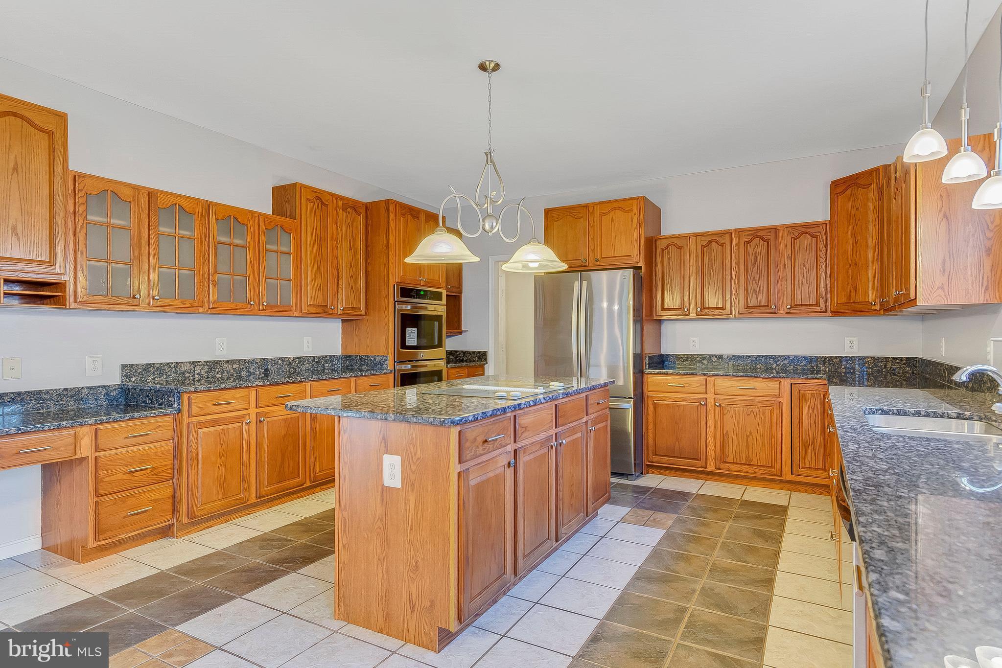 4613 Green Ridge Court Huntingtown, MD 20639 - Photo 7 of 29 Loads of cabinets, instant hot water dispenser