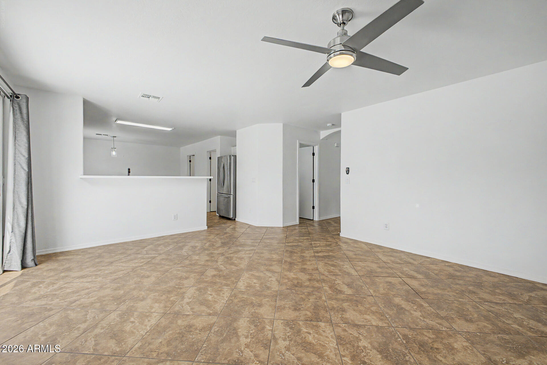 8337 West Payson Road Tolleson, AZ 85353 - Photo 12 of 44 Familyroom to Kitchen
