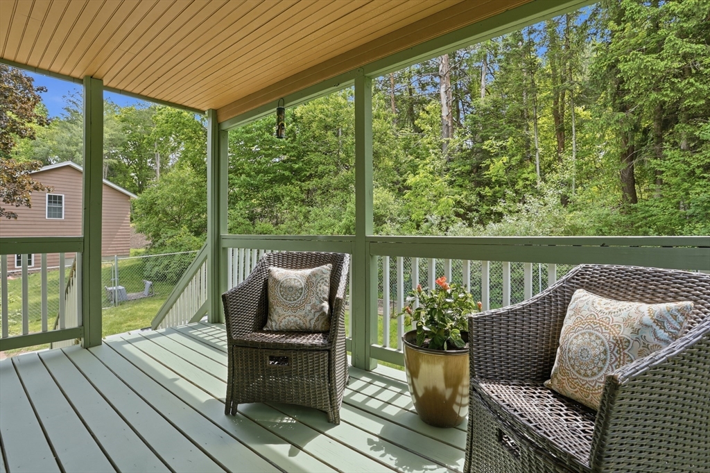 33 Simon Willard Road Acton, MA 01720 - Photo 31 of 42 a deck view with a seating space