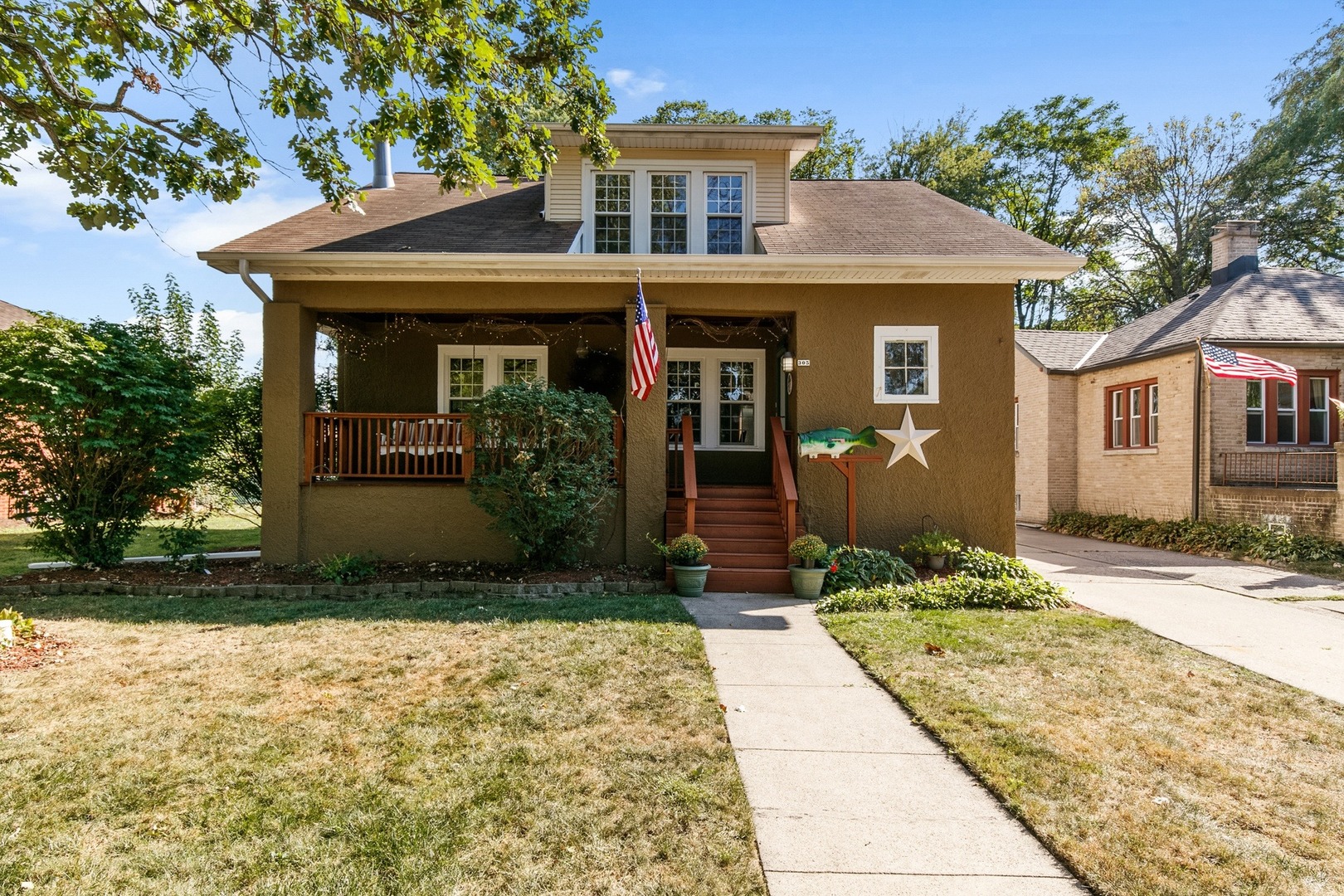 305 Olmsted Road Riverside, IL 60546 - Photo 1 of 33 a front view of a house with a yard