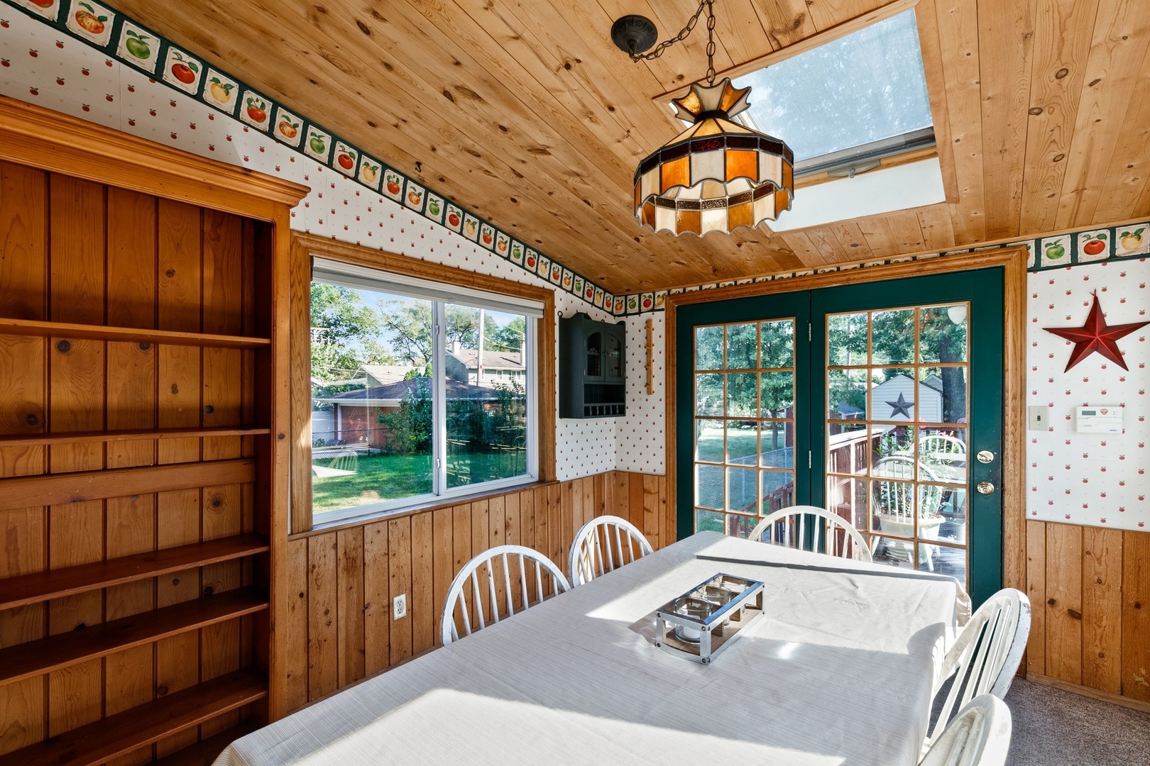 305 Olmsted Road Riverside, IL 60546 - Photo 11 of 33 a view of a dining room with furniture window and outside view