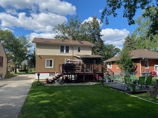 305 Olmsted Road Riverside, IL 60546 - Photo 26 of 33 a view of a house with a garden