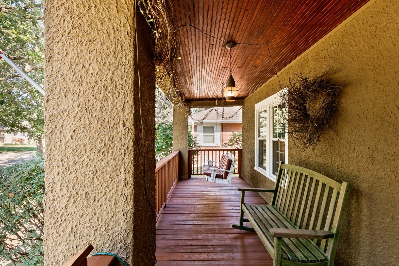 305 Olmsted Road Riverside, IL 60546 - Photo 27 of 33 a view of a patio with wooden floor and iron fence