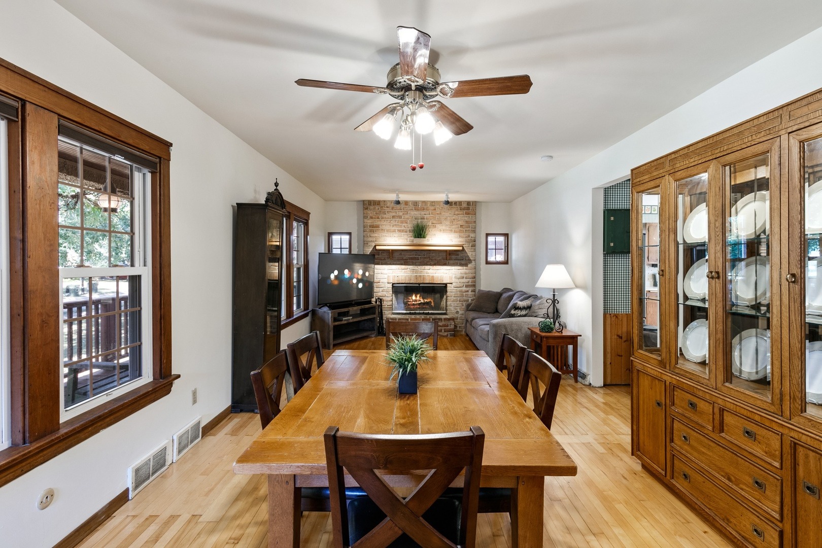 305 Olmsted Road Riverside, IL 60546 - Photo 4 of 33 a view of a dining room with furniture window and wooden floor