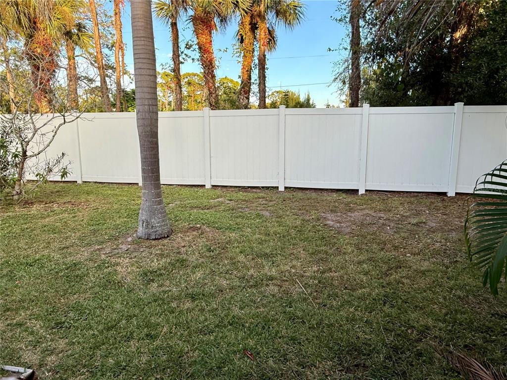 6091 Peony Road Venice, FL 34293 - Photo 10 of 12 a view of a yard