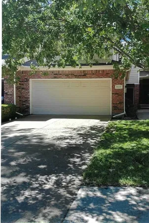a view of yard with large tree