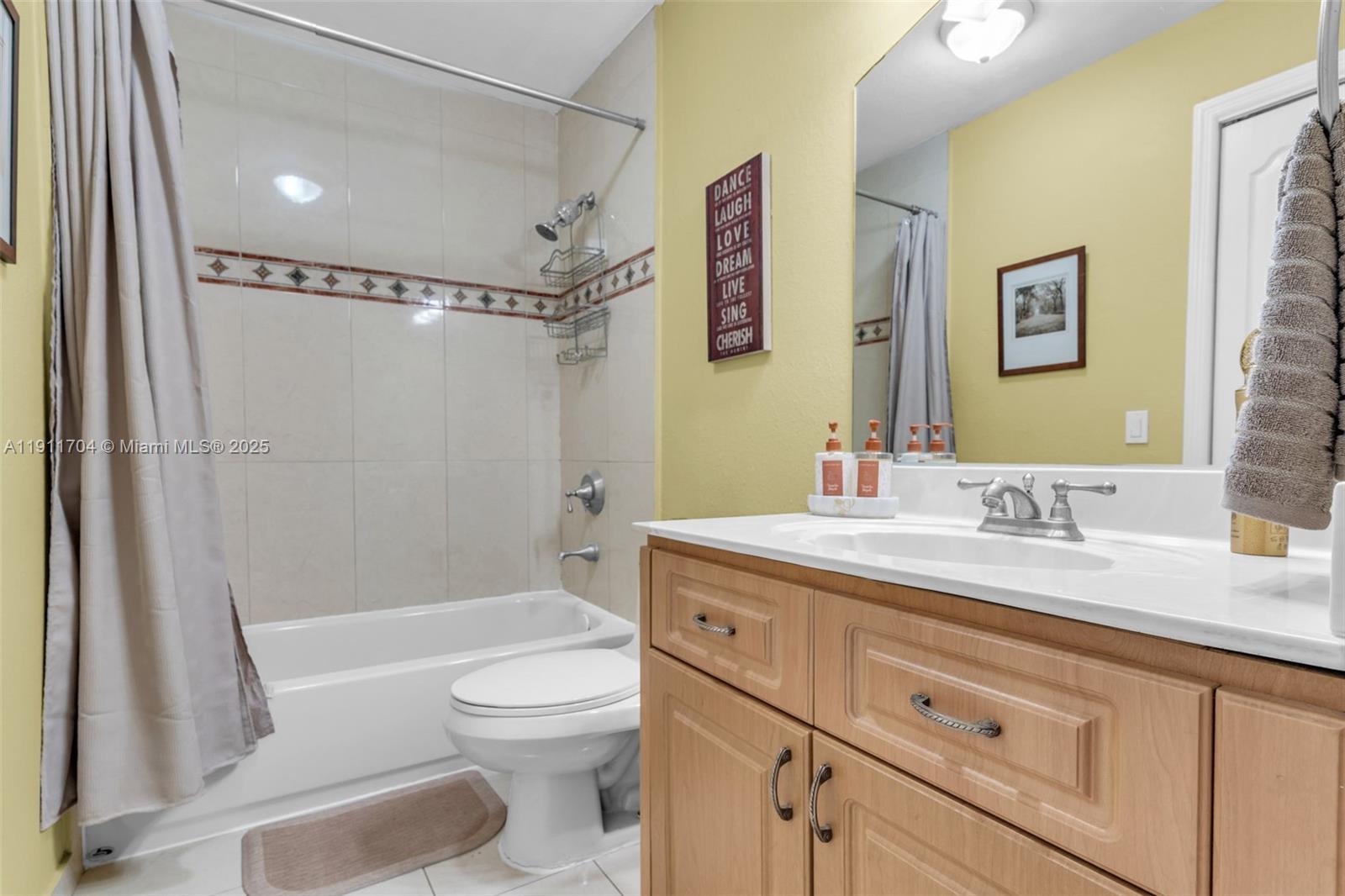 10523 Southwest 161st Place Miami, FL 33196 - Photo 19 of 26 a bathroom with a granite countertop sink toilet and shower