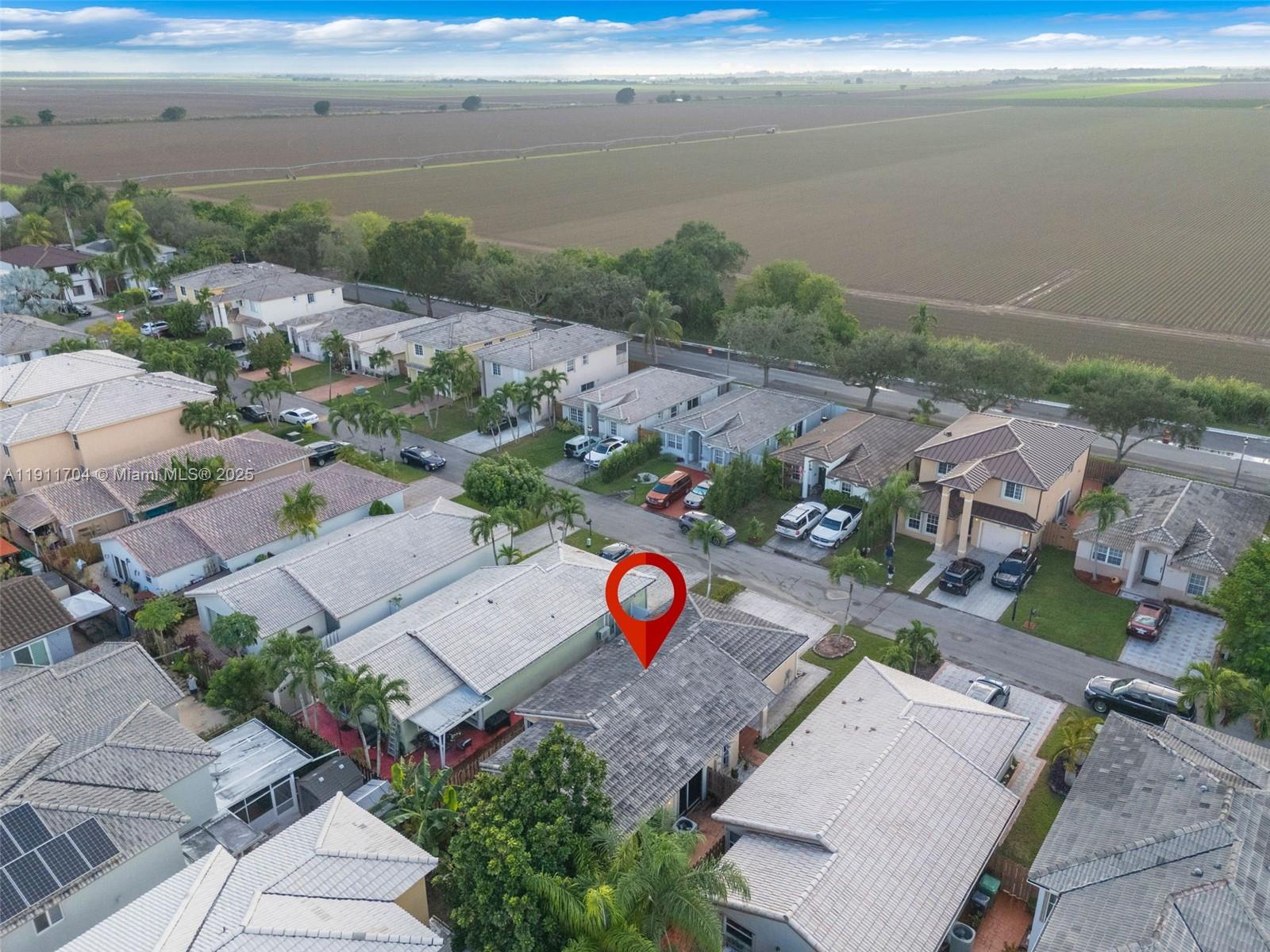 10523 Southwest 161st Place Miami, FL 33196 - Photo 24 of 26 an aerial view of multiple house