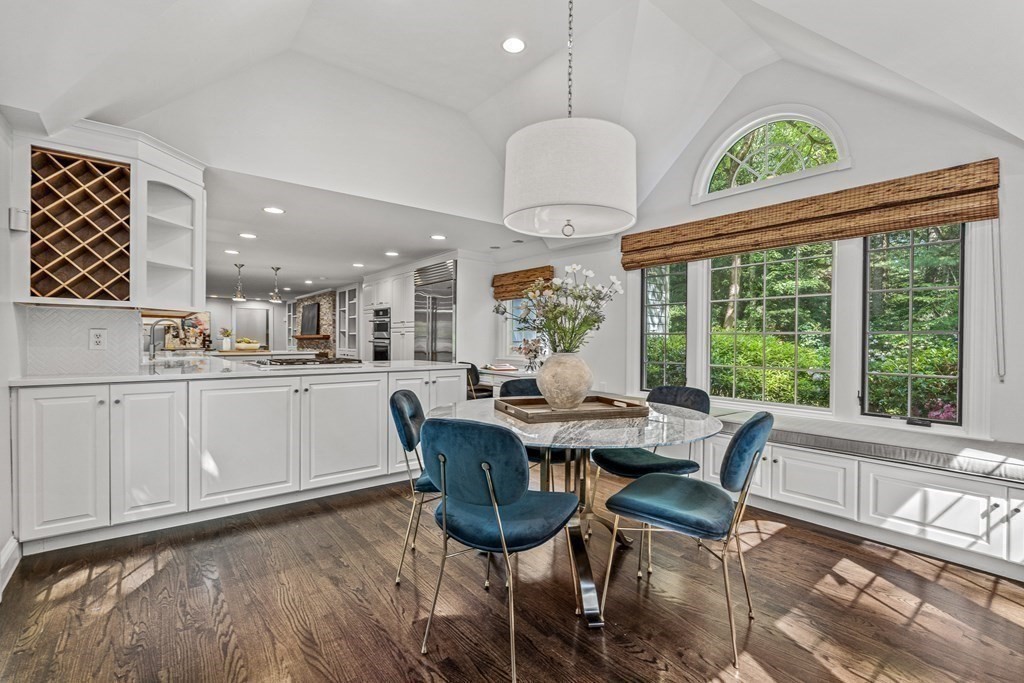 255 Westerly Road Weston, MA 02493 - Photo 12 of 35 a dining room with furniture a rug and a large window